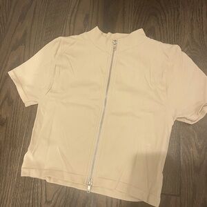 Tan brown tight zip up shirt size small.
